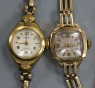 A ladys' 9ct gold wristwatch with gatelink bracelet and cushion-shaped dial and another wristwatch.