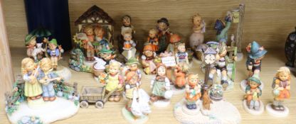 A collection of Hummel figures tallest 18cm