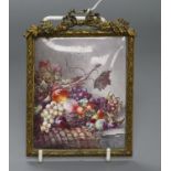 An early 19th century enamel plaque decorated with a still life of fruit 11.5 x 9.5cm