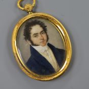 A 19th century Continental oil on ivory miniature of a gentleman, ormolu framed, 5 x 4cm