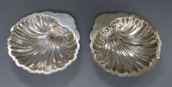 A pair of Jennings sterling silver butter shells, 17.8cm, 10.5 oz.