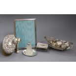 A small collection of silver and silver-mounted items, including a pair of embossed silver-backed