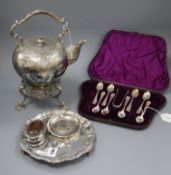 A plated kettle on stand and sundry plated items, including a part set of teaspoons and sugar tongs,