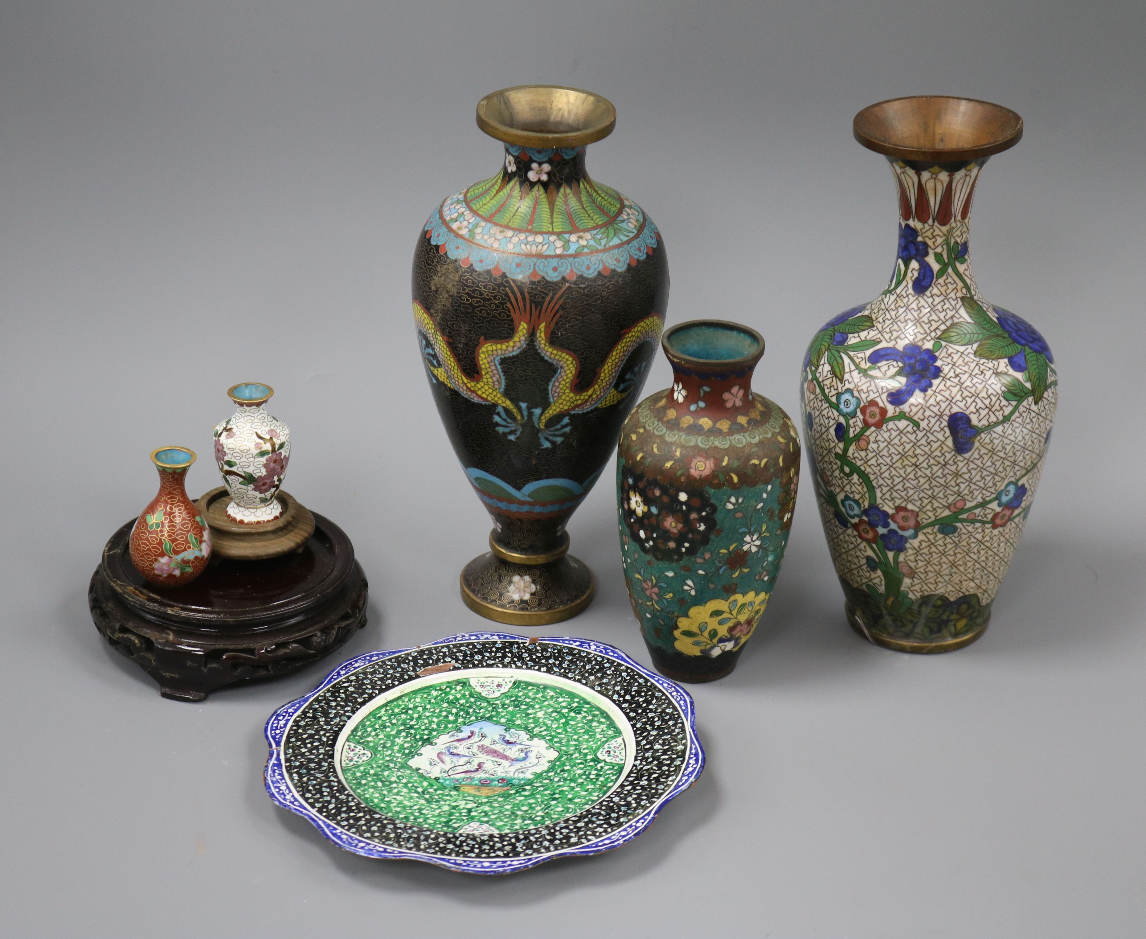 A quantity Chinese and Japanese cloisonne vases and Persian enamelware