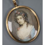A 19th century Continental oil on ivory miniature of a lady with flower in her hair 4.5 x 4cm,