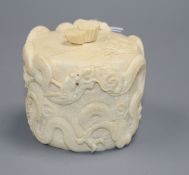 A Japanese Meiji period tusk box and cover carved with dragons with mother of pearl eyes, crack to