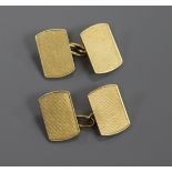 A pair of 18ct gold engine-turned cufflinks, 11.6 grams.