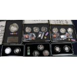 Royal Mint silver proof commemorative coin sets - D-Day Landings £10 coin and two 3-coin medal sets,