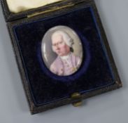 An 18th century enamel miniature of a gentleman wearing a lilac coat 3.5 x 2.75cm, unframed