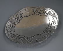 A pierced silver quatrefoil presentation dish, inscribed: 'To Paddy [John Paddy Carstairs, film