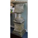 A large garden urn on on pedestal base W.approx. 80cm