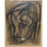 A charcoal sketch of a head of girl, indistinctly signed 42 x 32cm