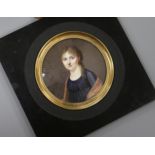 A 19th century French oil on ivory miniature of a lady, 6.5cm, later framed