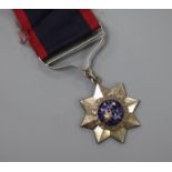 An Indian Order of Merit in silver, stamped verso 2nd Class Order of Merit, fixing nut missing
