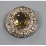 A Scottish celtic design silver and citrine cloak brooch, 38mm.