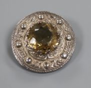 A Scottish celtic design silver and citrine cloak brooch, 38mm.