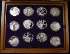The Royal Mint Queen Elizabeth II Golden Jubilee Collection - 19 sterling silver proof five dollars,