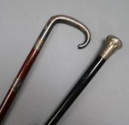 Two silver handled walking sticks longest 91cm