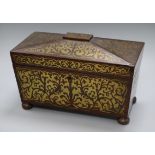 A Regency rosewood two-division tea caddy, of sarcophagus form inlaid with cut brasswork (two