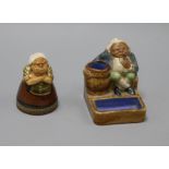 A Royal Doulton "Votes for Women" figure and a Doulton match holder tallest 9cm