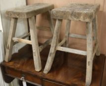 Two similar 19th century rustic stools W.49.5 and 45cm