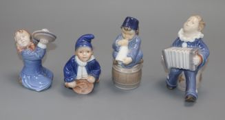 Four Royal Copenhagen models of children playing musical instruments, numbers 3677 (2), 148 and 3689