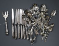 A silver spoon and pusher, a collection of small silver flatware, six silver-handled butter knives