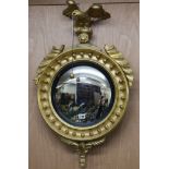 A circular gilt mirror W.52cm
