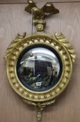 A circular gilt mirror W.52cm