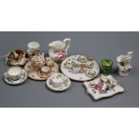 A group of miniature china including teasets, cup and saucers, jugs, etc.