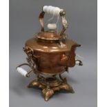 A Victorian copper kettle on stand, fitted ceramic handles overall 38cm