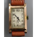 A gentleman's 1930's 9ct gold rectangular cased manual wind wrist watch.