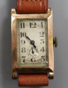 A gentleman's 1930's 9ct gold rectangular cased manual wind wrist watch.