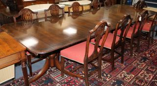 A George III style mahogany two-pillar dining table (with two additional leaves) 323cm fully
