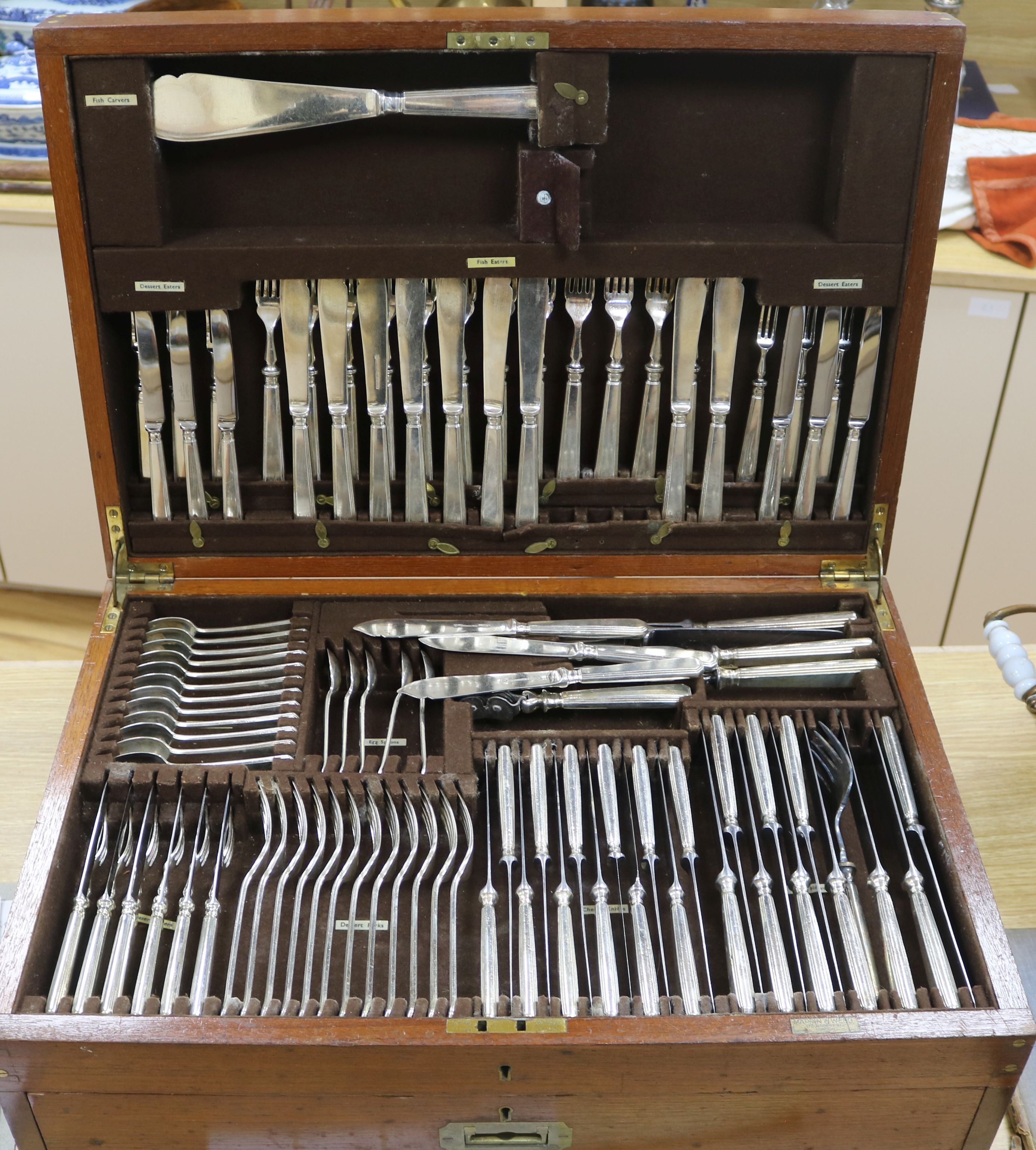 An extensive service of Mappin & Webb Princes Plate flatware, initialled, in oak canteen