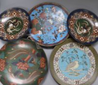 A Japanese cloisonne charger, decorated with a quail and prunus and four other cloisonne dishes,