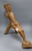 A carved wooden model of Christ height 59cm