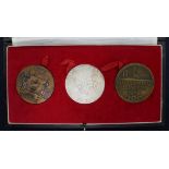 A 1948 Olympics bronze medallion and two 1972 commemorative FA Cup medallions, one in silver, the