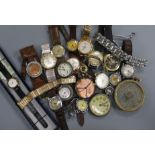 A group of assorted wrist watches including Titus and military and three silver watches.