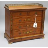 A painted miniature satinwood Wellington chest length 43cm