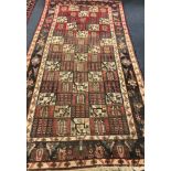 A Baltian multi coloured rug 290 x 50cm