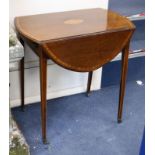 A satinwood-banded mahogany oval Pembroke table W.71cm