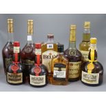 Nine assorted bottles of spirits including whisky, cognac and Grand Marnier.