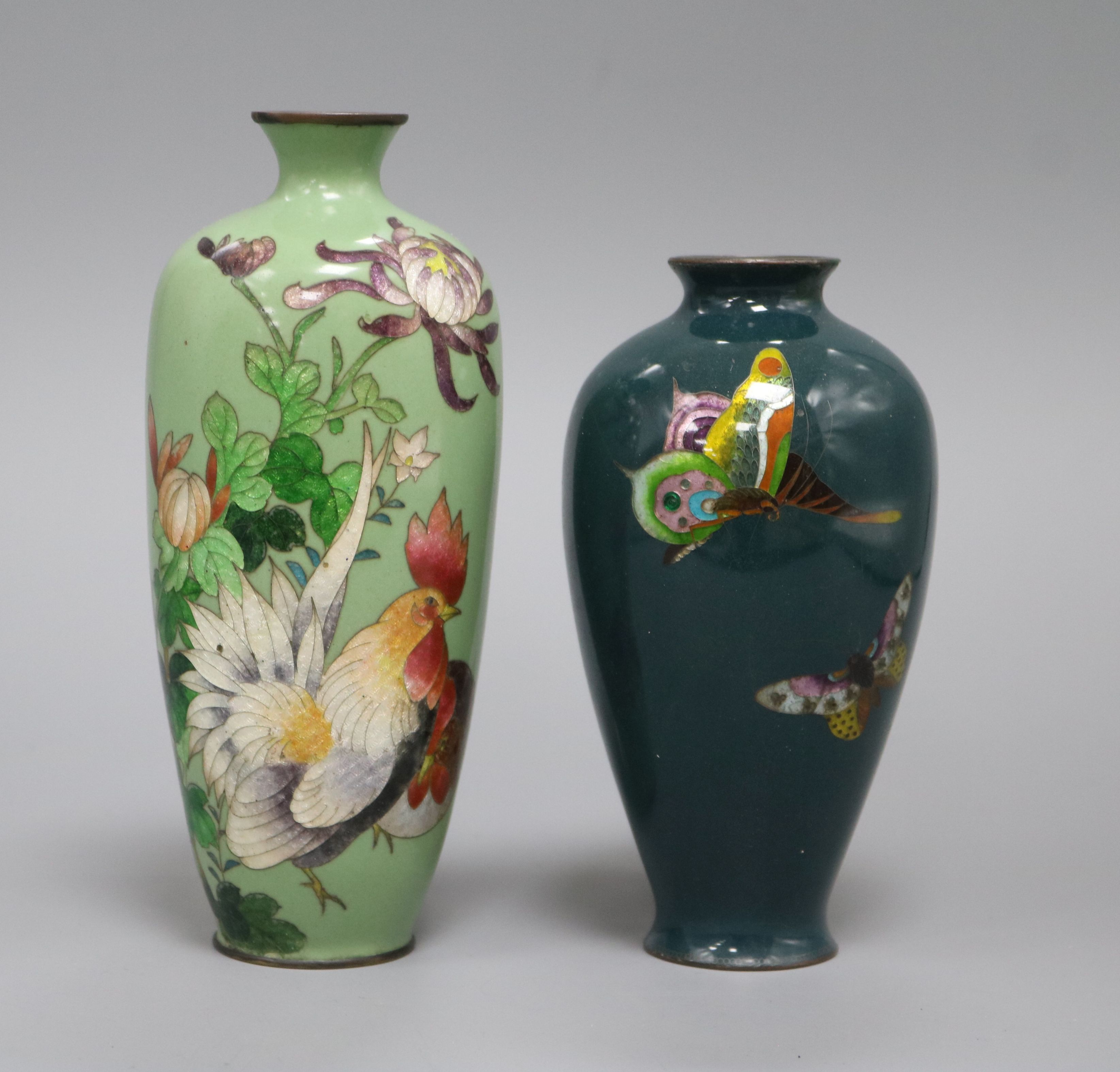 A Japanese Ginbari enamelled vase decorated with a cockerel on a green ground and a smaller vase