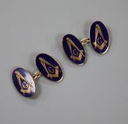 A pair of late 1950's 9ct gold and blue enamel oval masonic cufflinks, gross 9.1 grams.