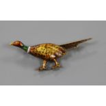 A yellow metal and polychrome enamel pheasant brooch, 48mm.