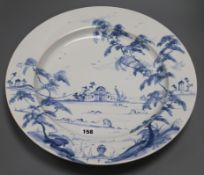 An Isis Ceramics 'English Garden' pattern large decorative shallow dish, pierced for wall