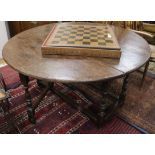 An 18th century oak gateleg table W.130cm