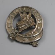 A Clan Campbell white metal cap badge stamped Scot Sterling 5.5cm