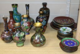 Nine various cloisonne vases, including four bottle-shaped examples, one with bold multi-coloured
